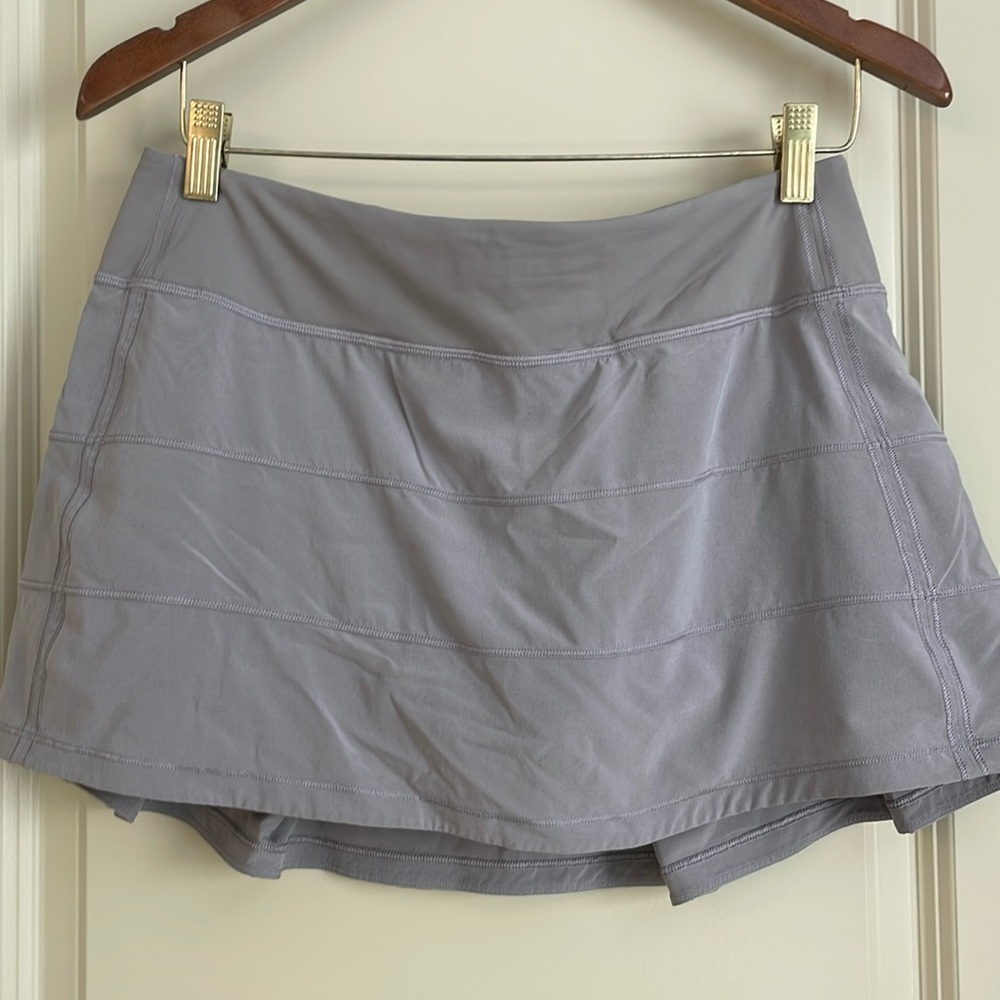 Lululemon skort 13” with inside pockets. Excellent condition like new.